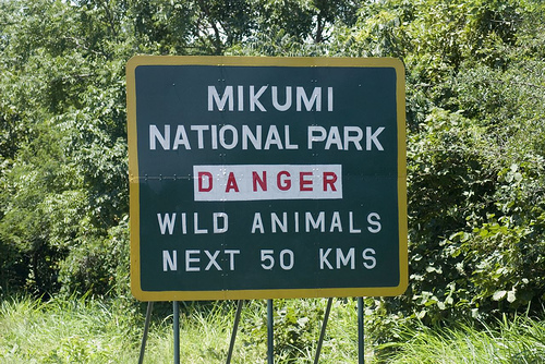 Road sign by Mikumi National Park